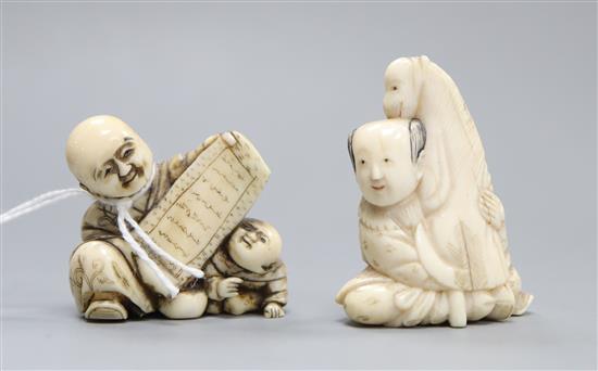 Two Japanese ivory netsuke, a boy with a hobby horse and a man and a boy, 19th century